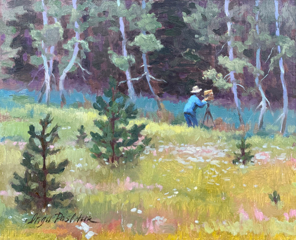 Painter in the meadow